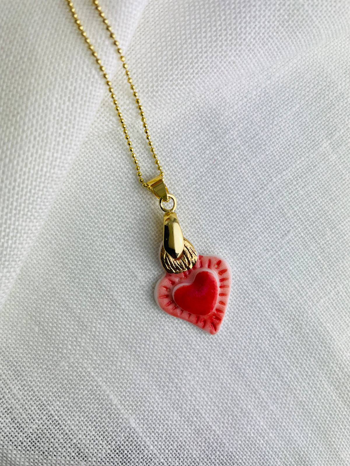 Collana Pallini Cuore Sacro in Porcellana